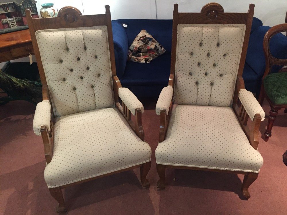 pair of arts and crafts fireside chairs c1910