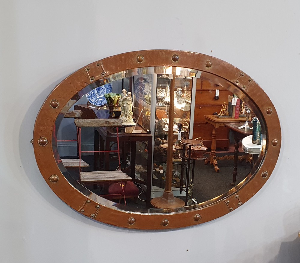 large liberty style arts crafts hammered copper oval mirror c1910
